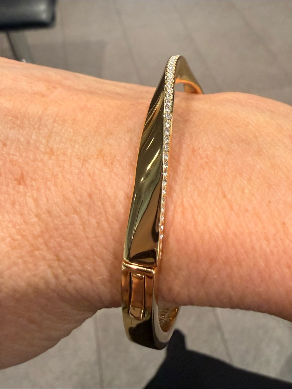 Kate Spade “do the twist” pave hinged gold tone bracelet with sparkling crystals